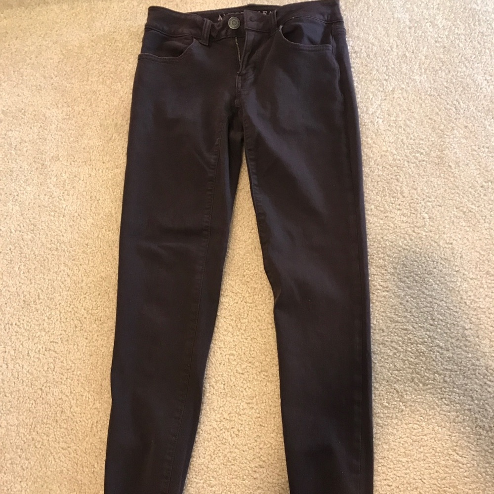 American Eagle plum colored skinny jeans